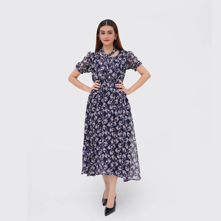 Chiffon maxi dress with puffy sleeves and neck knot