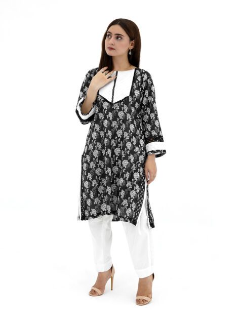 Women’s Black and White Floral Shirt Paired with Plain Trousers